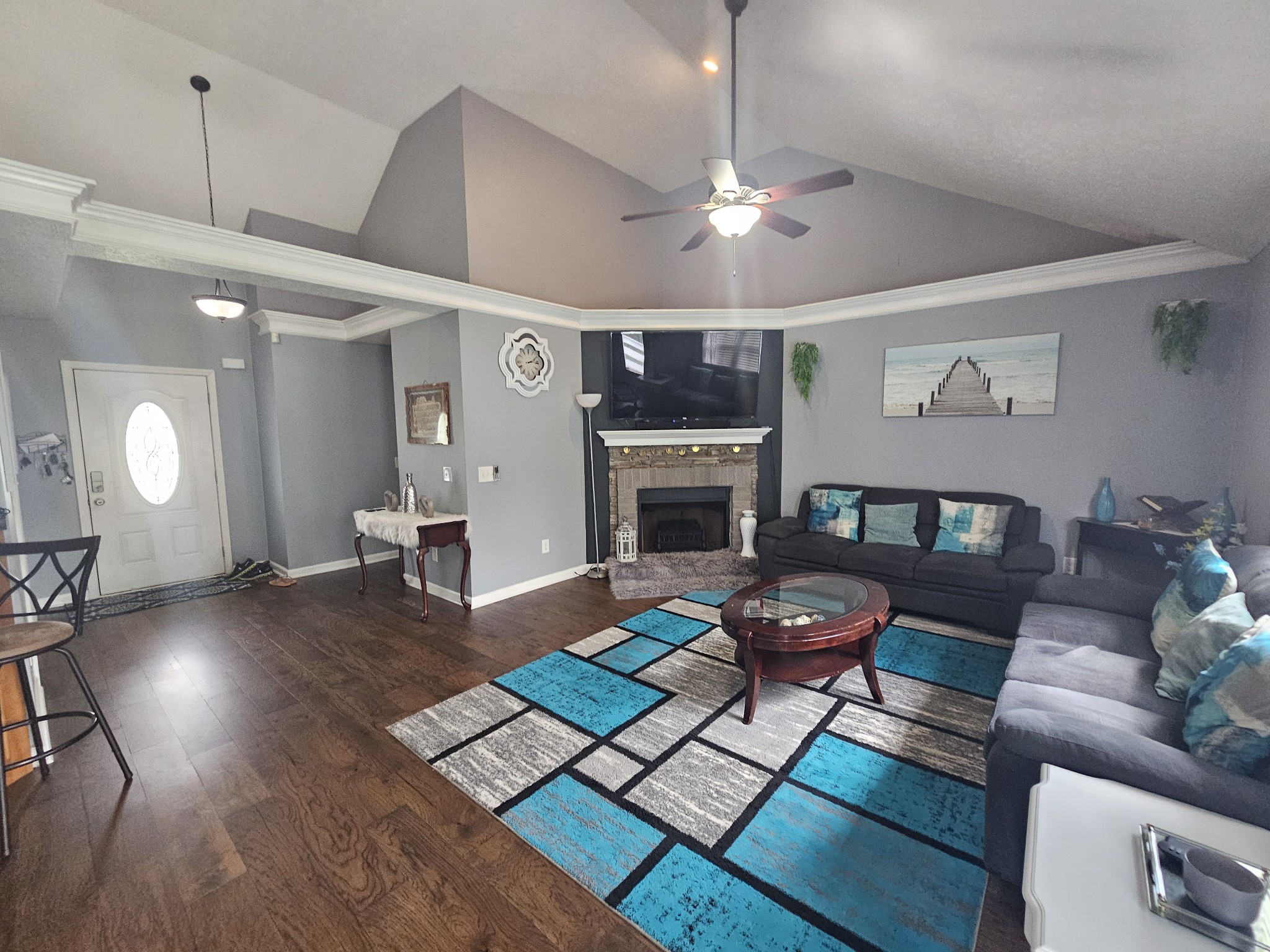 328 Airport Road Portland, TN 37148 - Photo 12 of 50 a living room with furniture and a fireplace