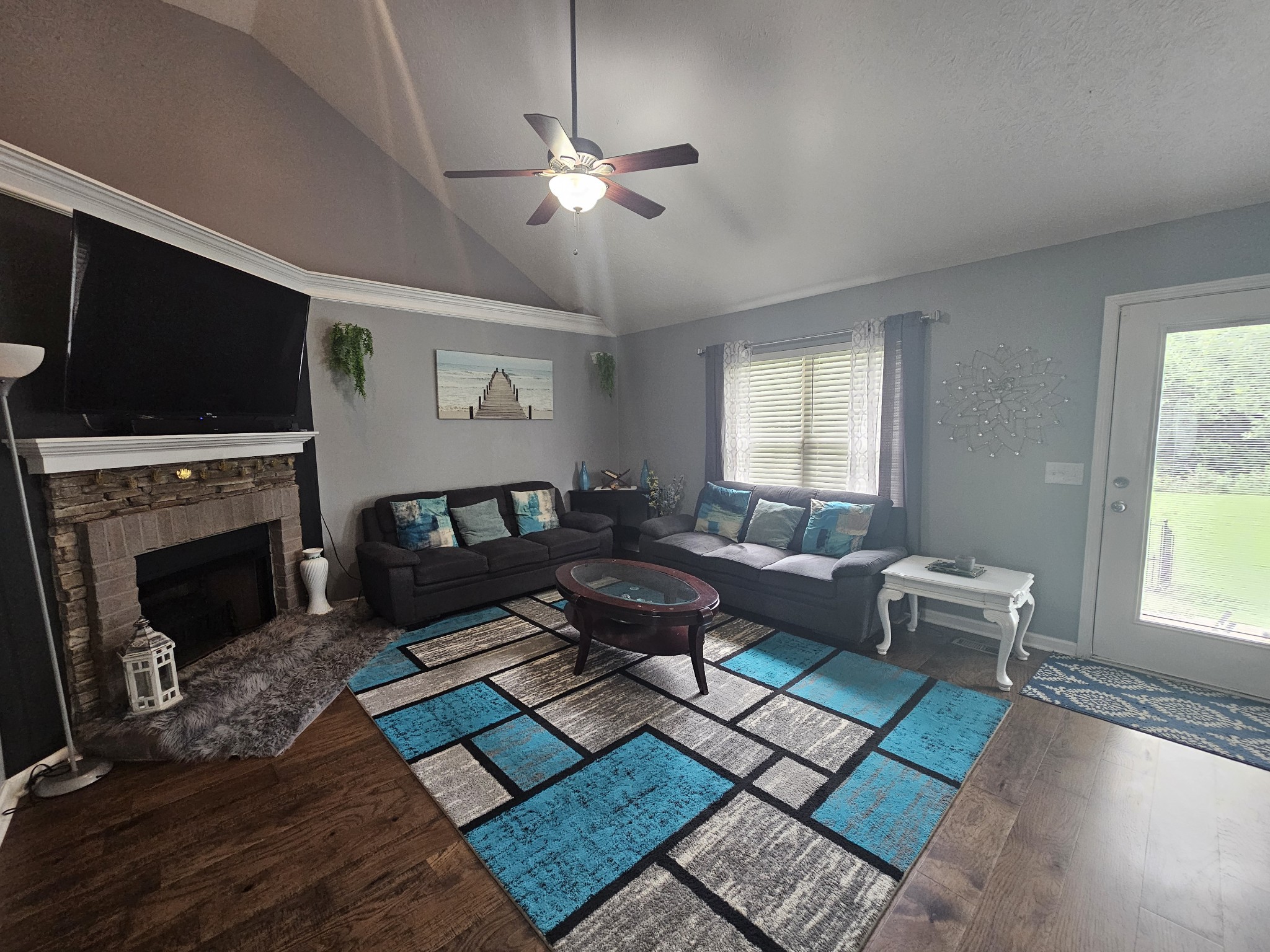 328 Airport Road Portland, TN 37148 - Photo 15 of 50 a living room with furniture and a fireplace