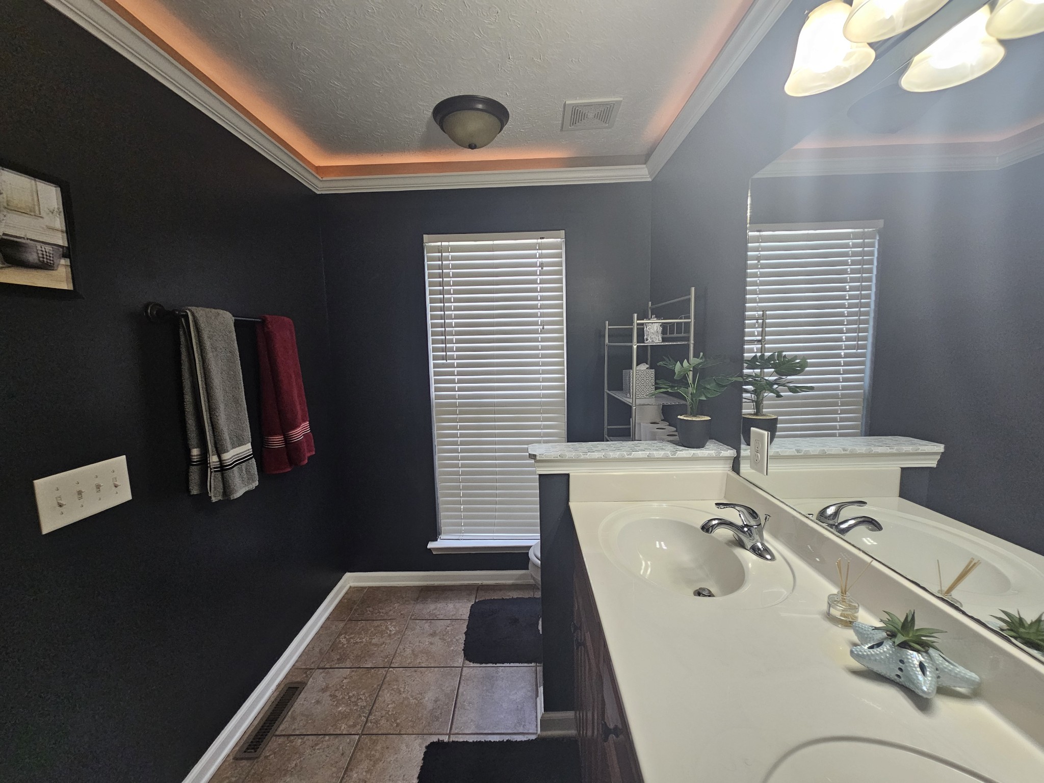 328 Airport Road Portland, TN 37148 - Photo 26 of 50 a bathroom with a tub sink and mirror