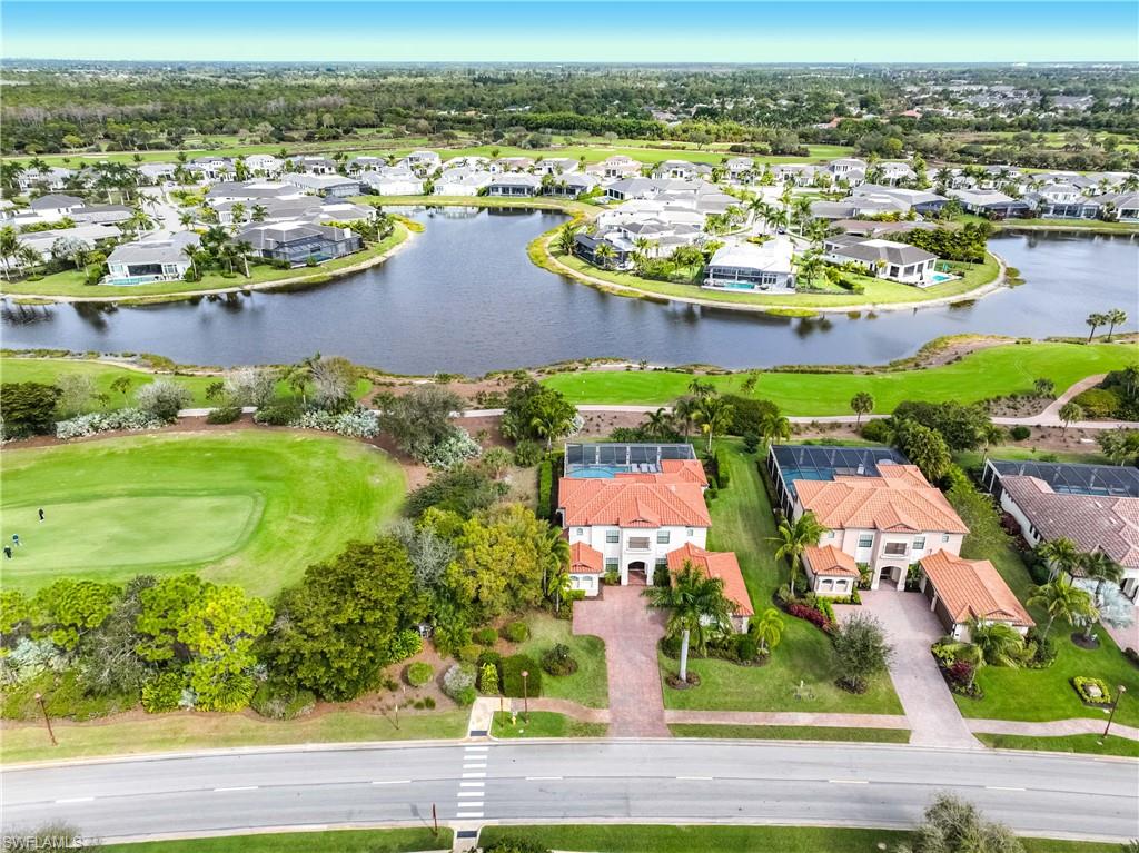 9852 Corso Bello Drive Naples, FL 34113 - Photo 46 of 50 View of property location with nearby suburban area, a large body of water, and a golf course