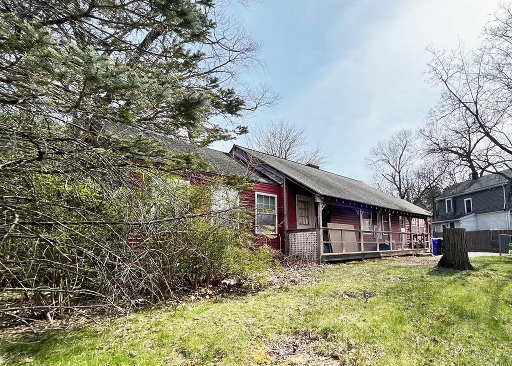 447 Plumtree Road Springfield, MA 01118 - Photo 10 of 10 a view of a house with a yard