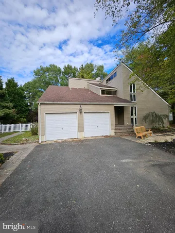 a car parked in front of a house