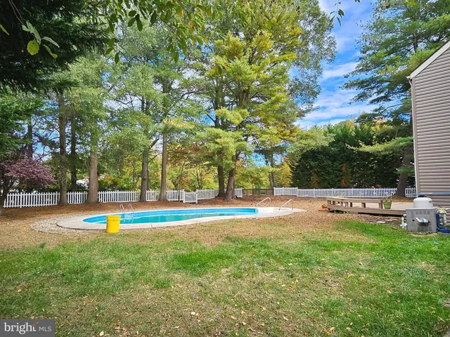 a view of a swimming pool with an outdoor space