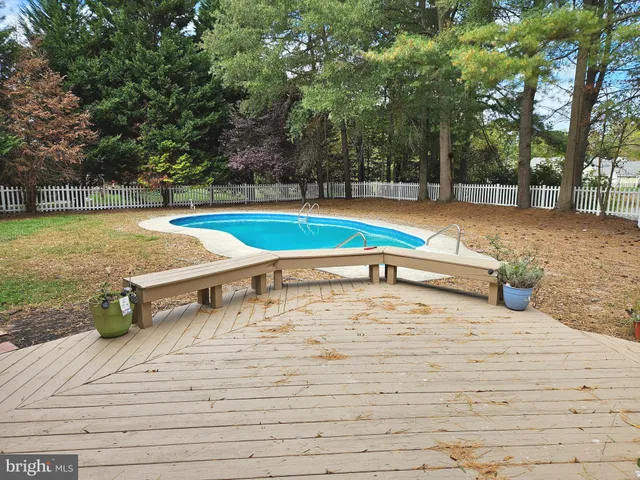a view of a playground with basketball court