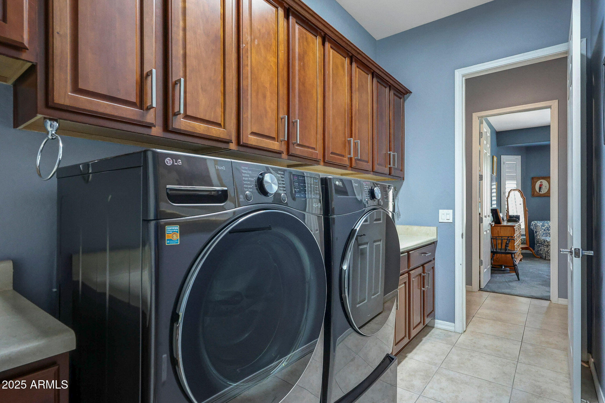 27042 West Burnett Road Buckeye, AZ 85396 - Photo 28 of 46 Laundry room w/cabs