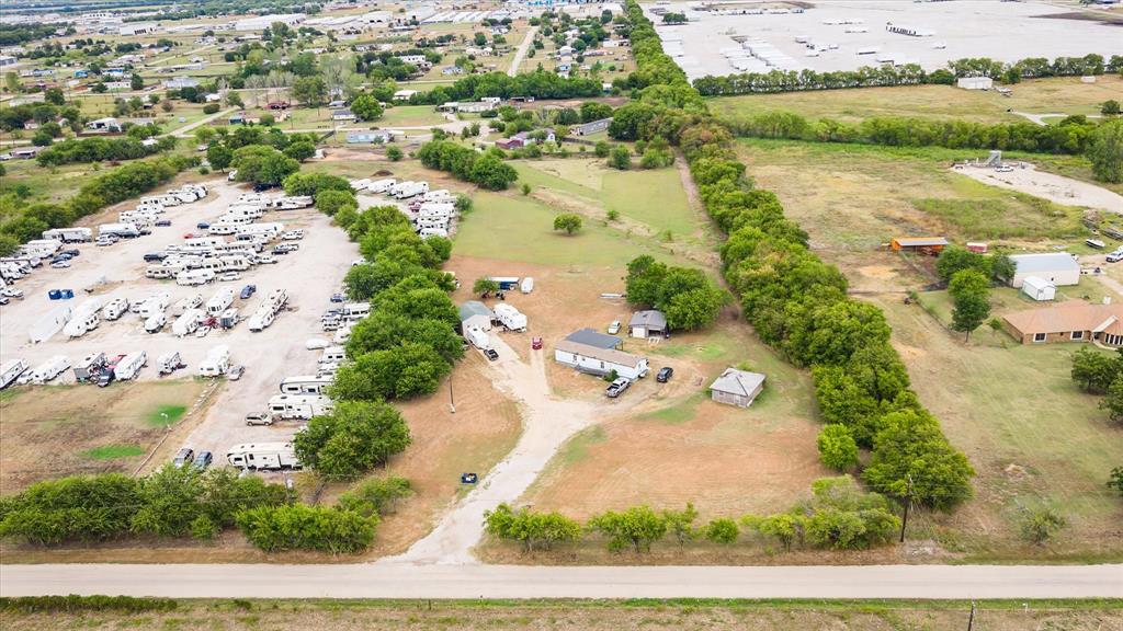 417 County Road 4840 Haslet, TX 76052 - Photo 3 of 15 an aerial view of a house with a lake view