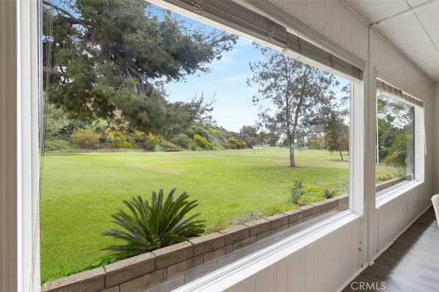 a bathroom with a granite countertop toilet sink and shower