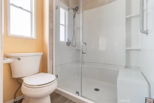 a view of a house with sitting area and garden