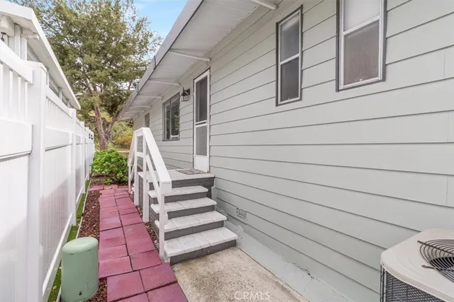 a view of a street with a tree
