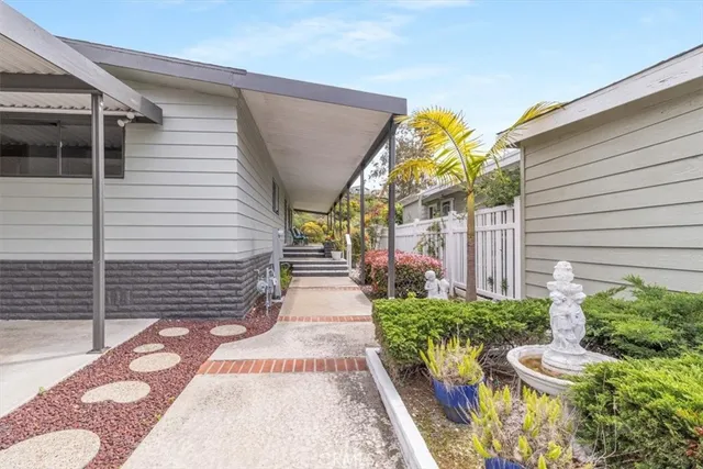a view of path along with potted plant