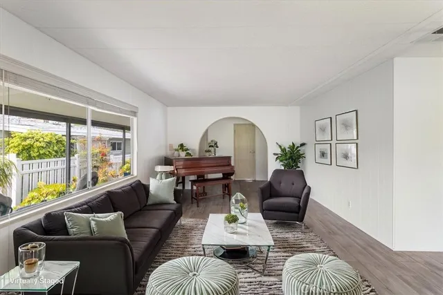 a kitchen with white cabinets and a sink