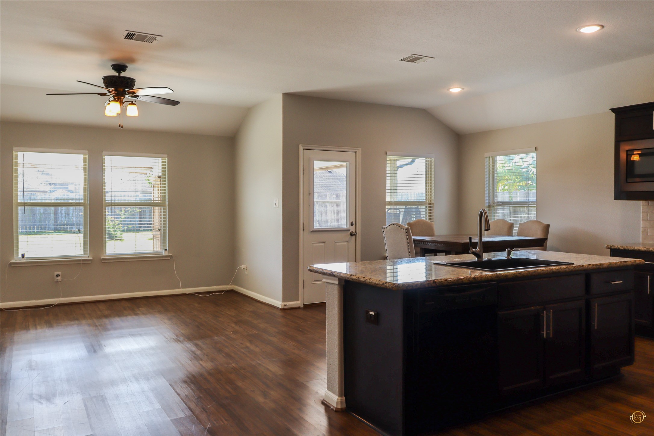 61 Rodeo Crest Drive Manvel, TX 77578 - Photo 23 of 30 a view of a kitchen counter space a sink wooden floor and appliances