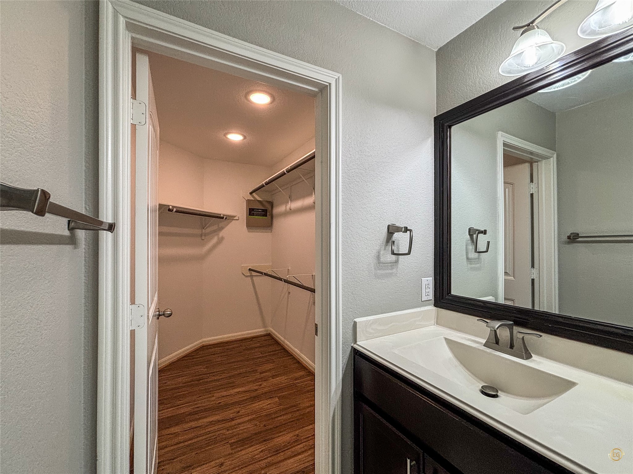 61 Rodeo Crest Drive Manvel, TX 77578 - Photo 28 of 30 a bathroom with a sink and a mirror
