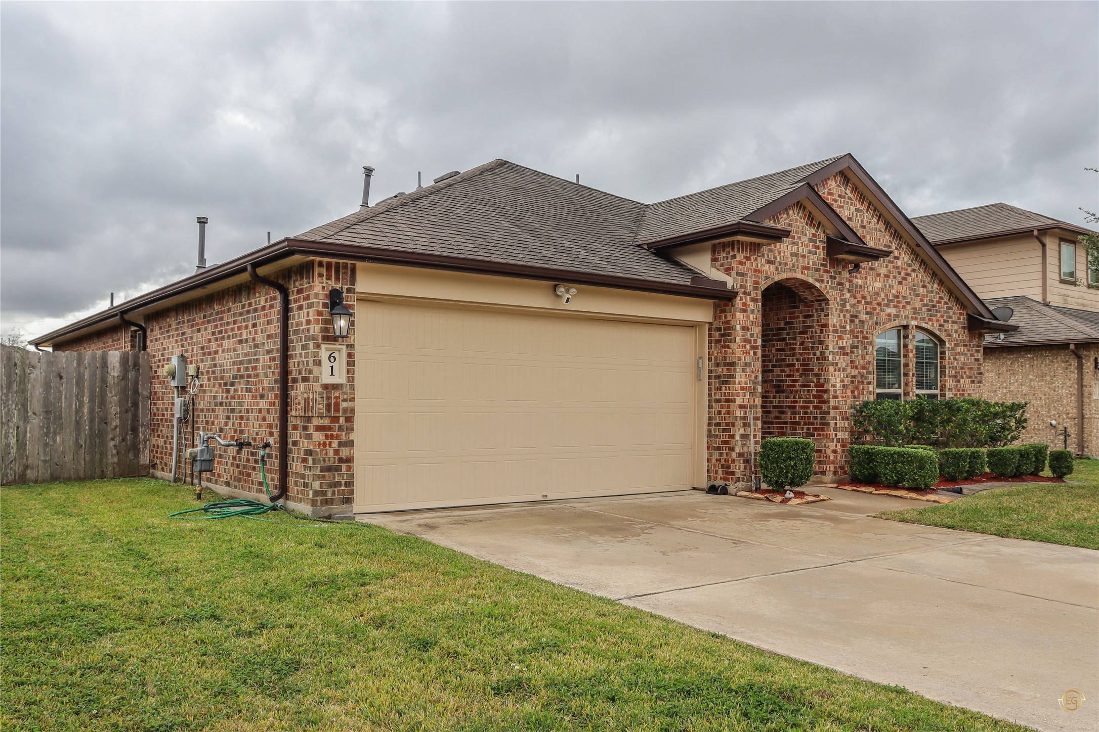 61 Rodeo Crest Drive Manvel, TX 77578 - Photo 3 of 30 a front view of a house with a yard