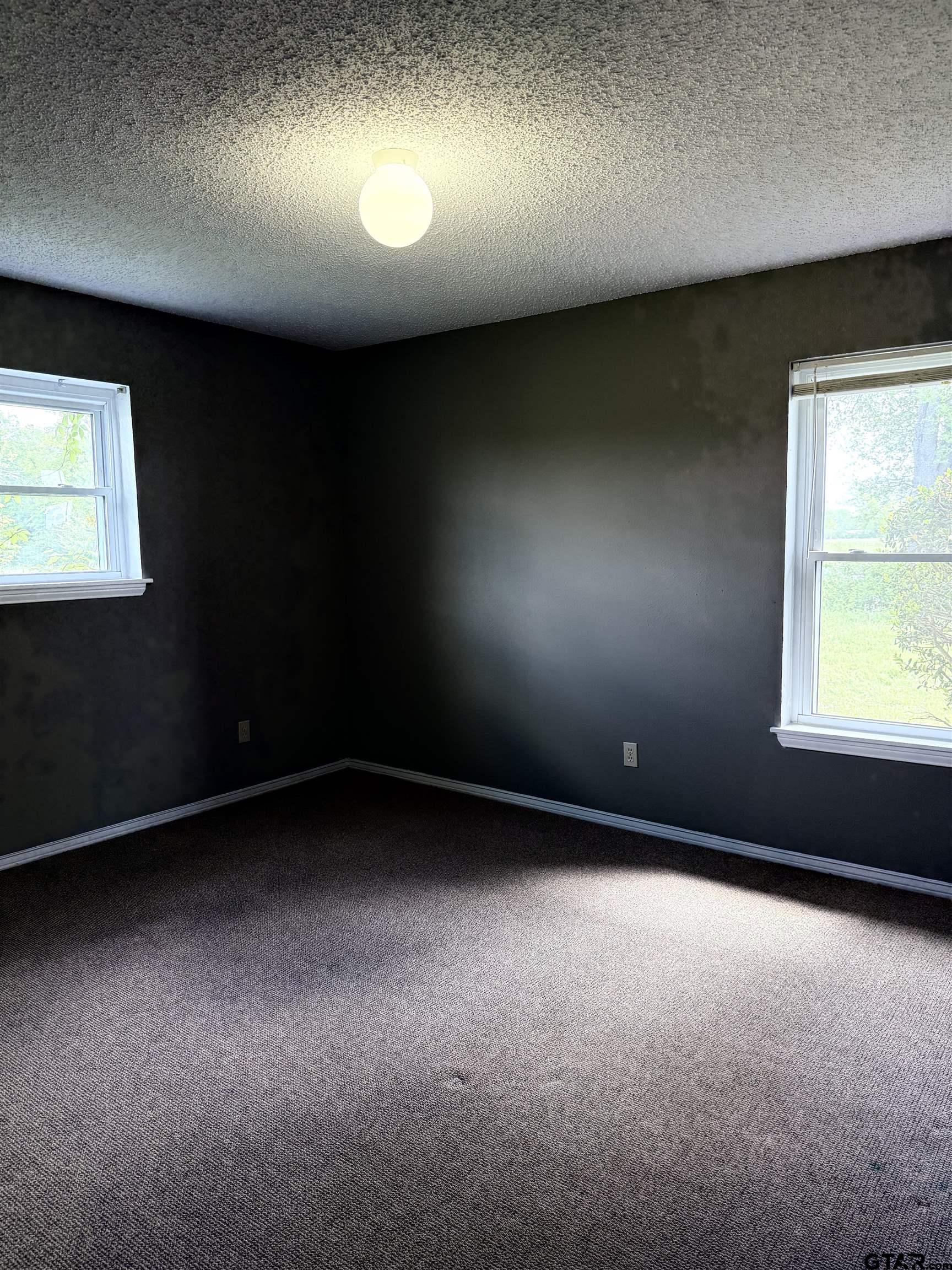 300 Black Oak Road Como, TX 75431 - Photo 19 of 34 an empty room with a window