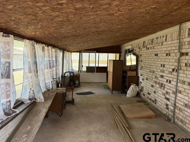 300 Black Oak Road Como, TX 75431 - Photo 26 of 34 a view of living room with furniture and floor to ceiling window