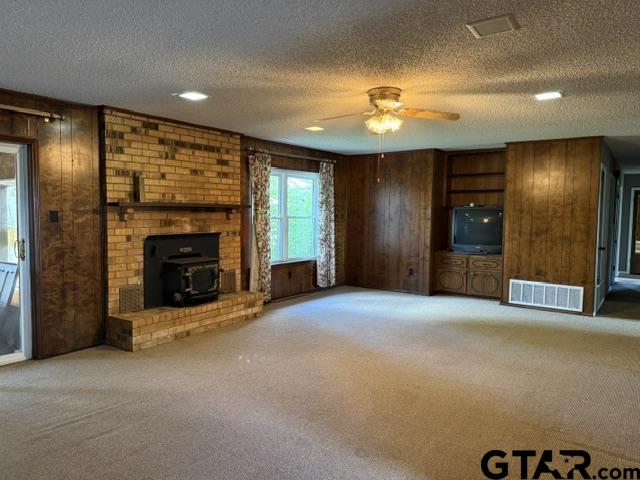 300 Black Oak Road Como, TX 75431 - Photo 5 of 34 a view of an empty room with a fireplace