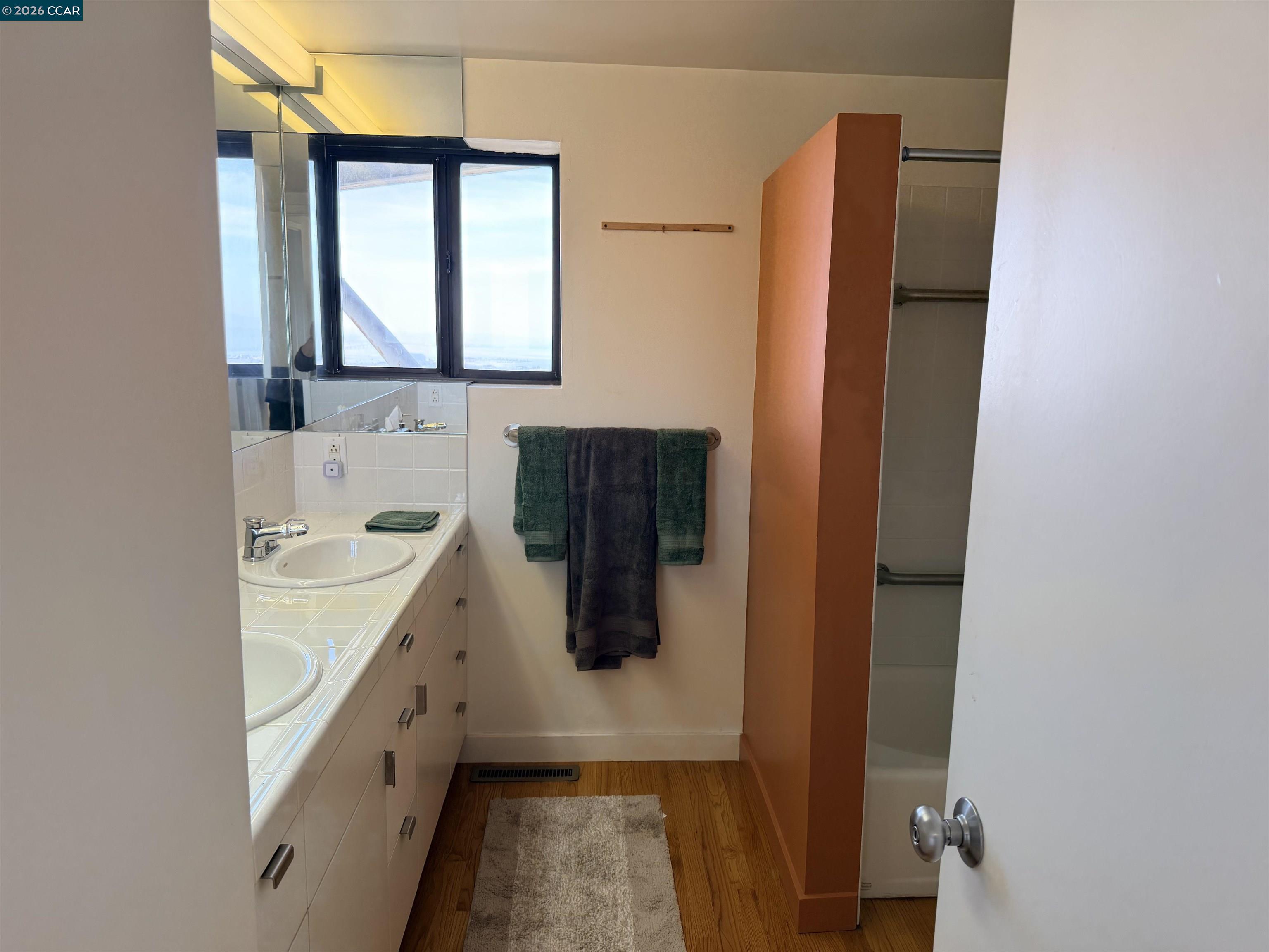 Claremont Hills Berkeley, CA 94705 - Photo 13 of 21 a bathroom with a sink and mirror
