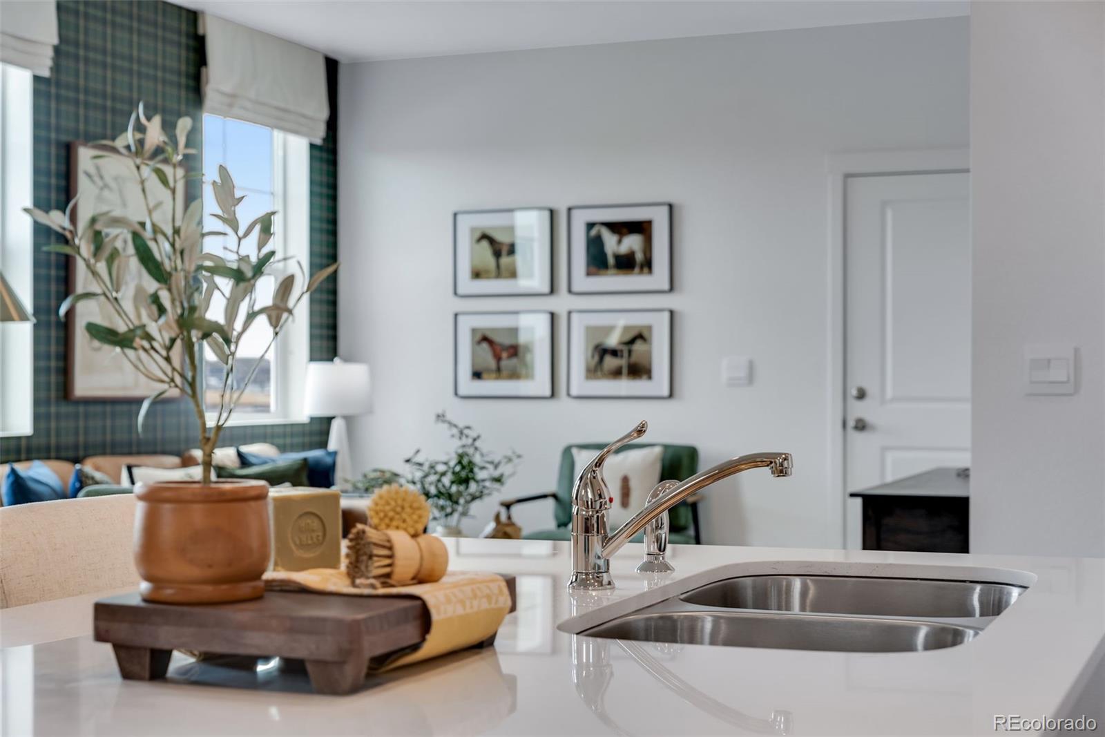 612 South Cabernet Avenue Fort Lupton, CO 80621 - Photo 19 of 49 a living room with furniture and a fireplace