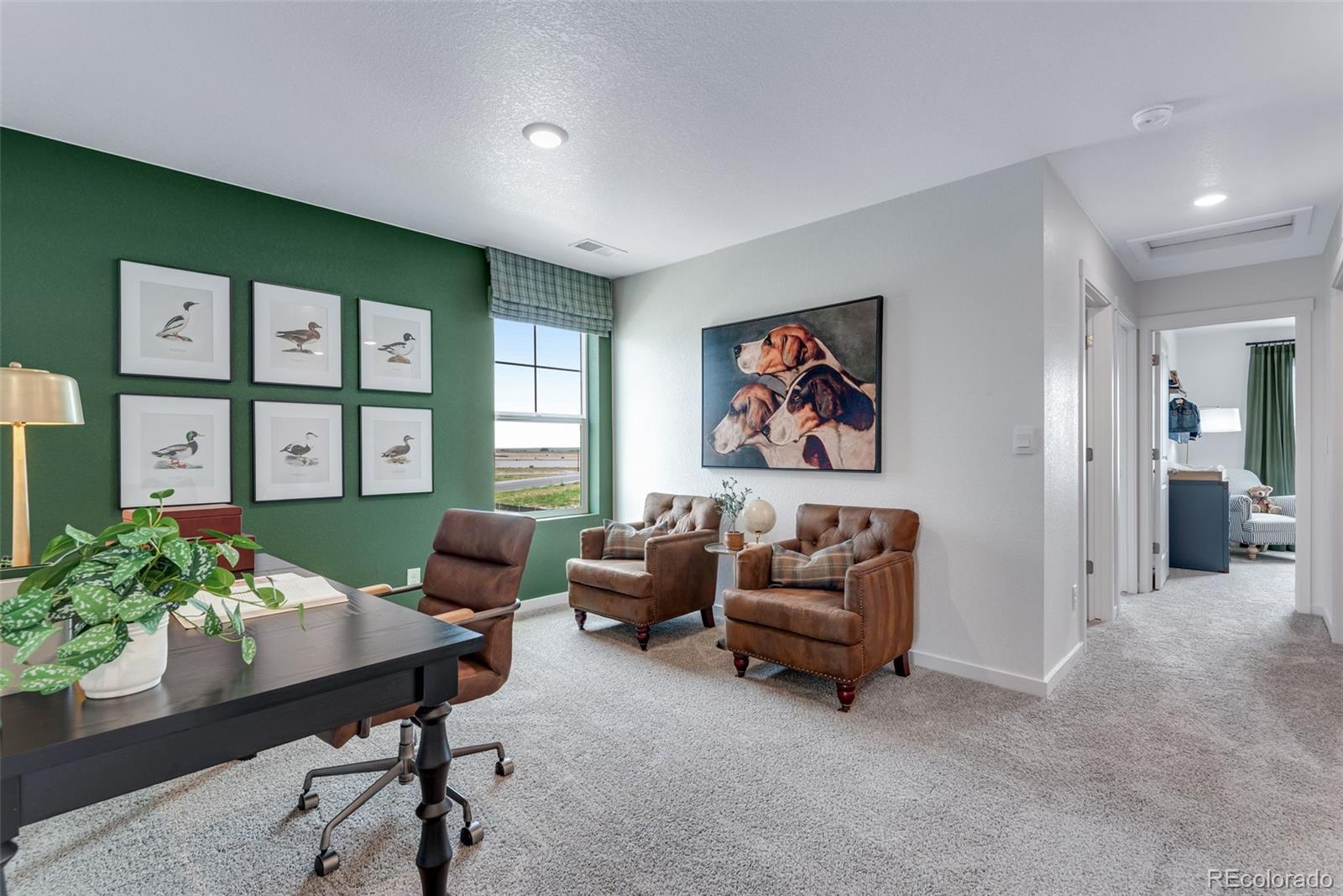 612 South Cabernet Avenue Fort Lupton, CO 80621 - Photo 25 of 49 a living room with furniture and a potted plant