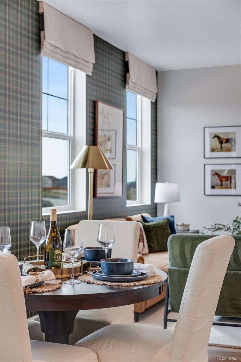 612 South Cabernet Avenue Fort Lupton, CO 80621 - Photo 3 of 49 a living room with furniture and a large window
