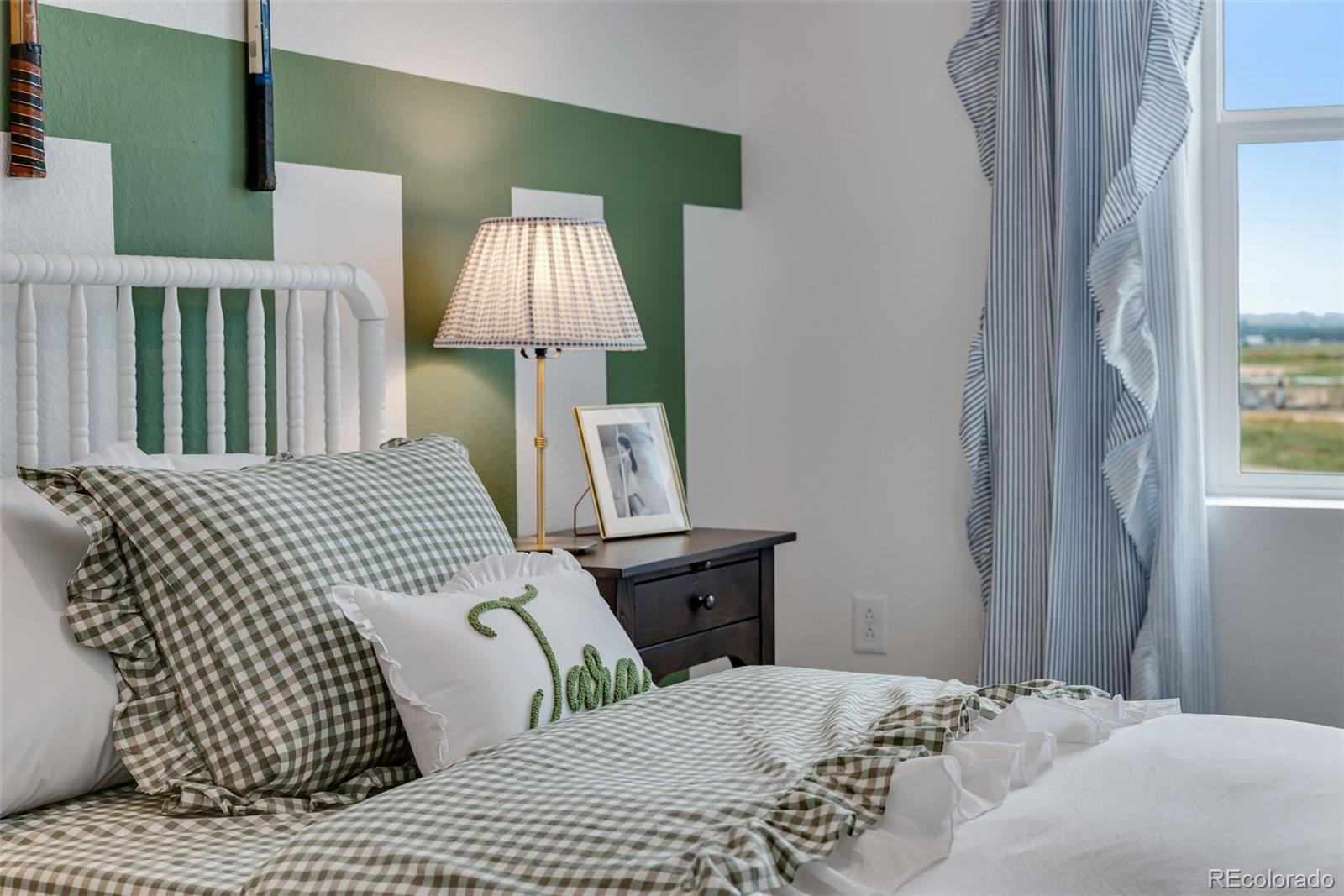 612 South Cabernet Avenue Fort Lupton, CO 80621 - Photo 39 of 49 a bedroom with a bed and a window