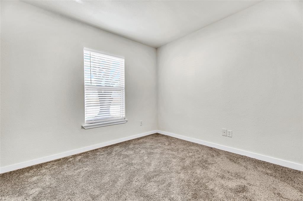 6321 Little Ranch Road North Richland Hills, TX 76182 - Photo 15 of 24 an empty room with a window