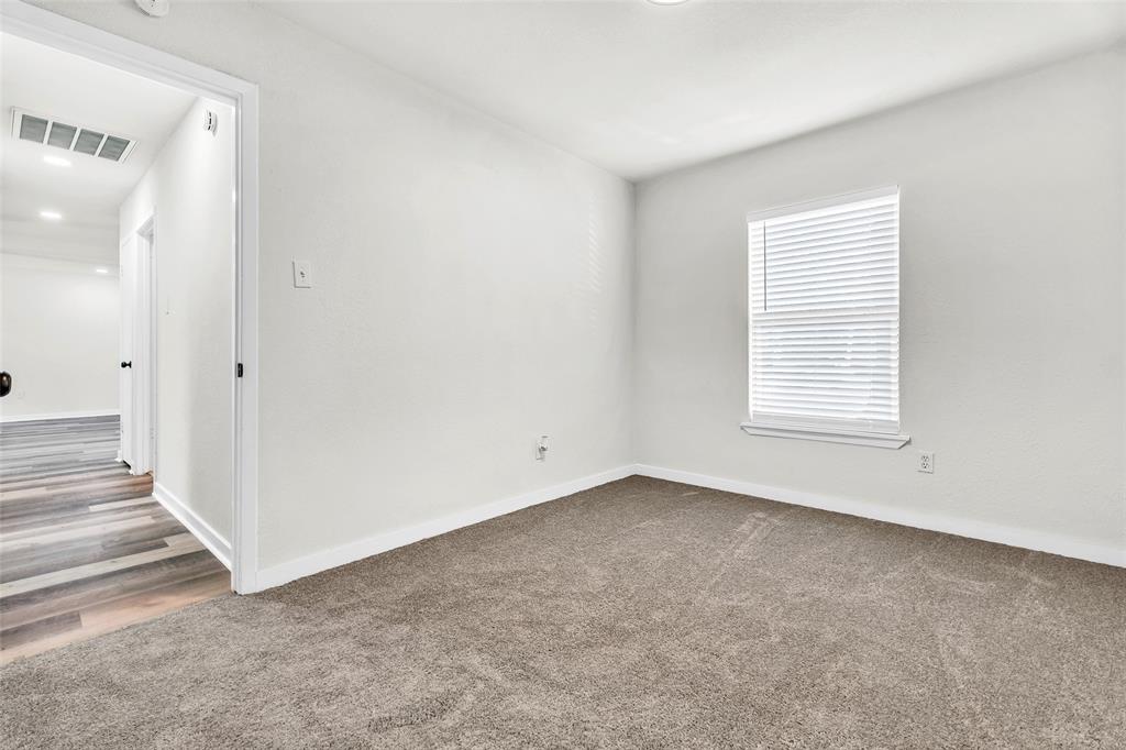 6321 Little Ranch Road North Richland Hills, TX 76182 - Photo 16 of 24 a view of an empty room with a window