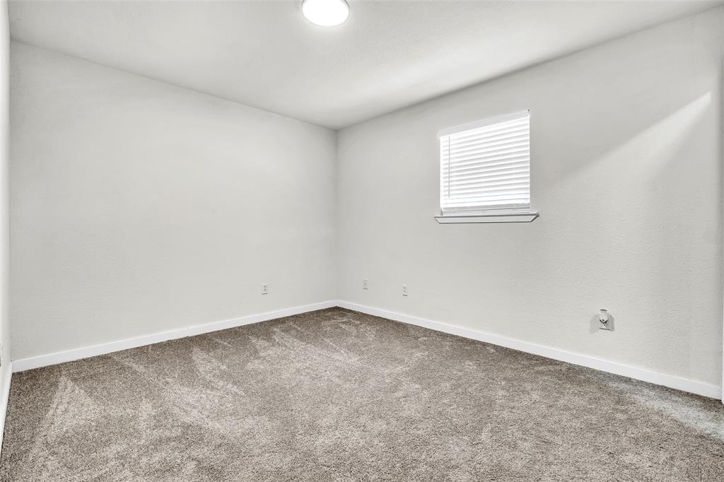 6321 Little Ranch Road North Richland Hills, TX 76182 - Photo 17 of 24 an empty room with a window