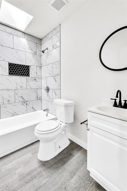 6321 Little Ranch Road North Richland Hills, TX 76182 - Photo 20 of 24 a bathroom with a toilet a sink and a shower