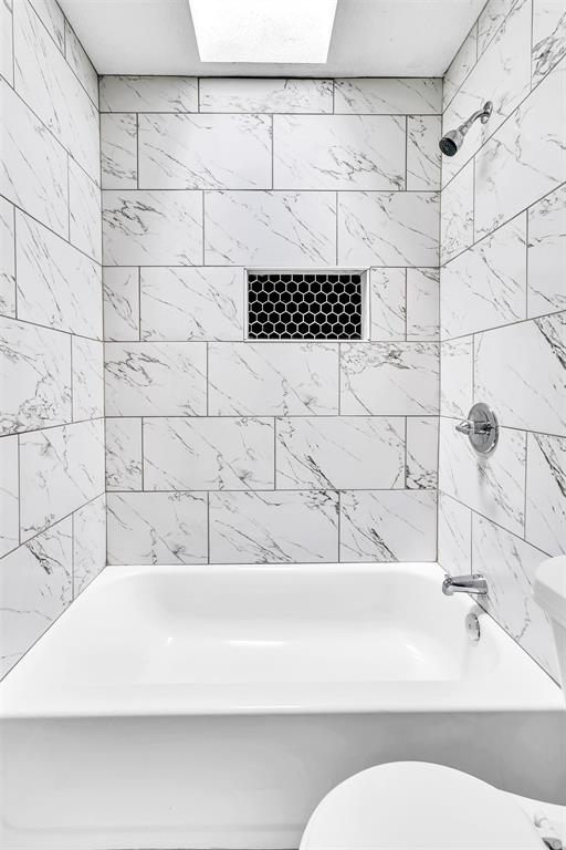 6321 Little Ranch Road North Richland Hills, TX 76182 - Photo 21 of 24 a bathroom with a bathtub and shower