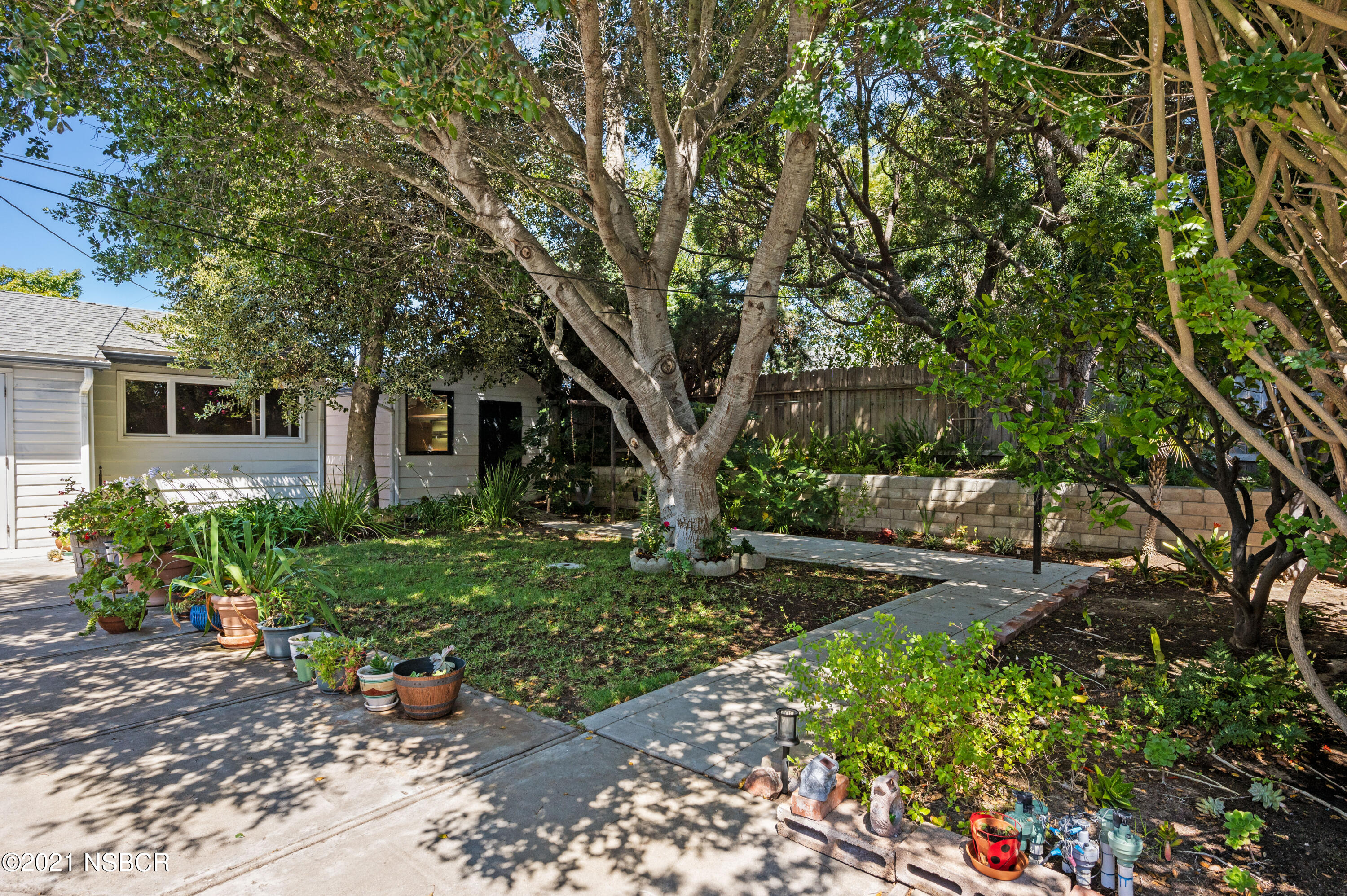 3432 Rucker Road Lompoc, CA 93436 - Photo 11 of 17 a front view of a house with garden