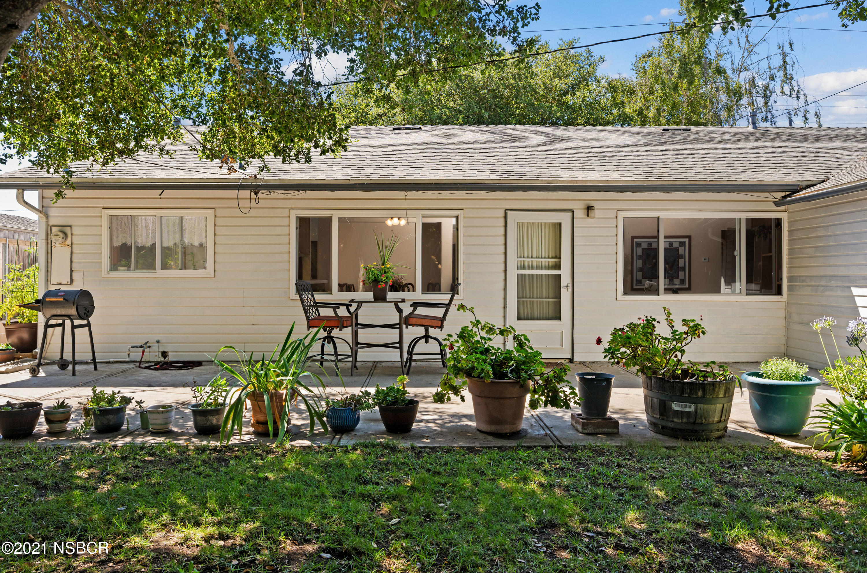 3432 Rucker Road Lompoc, CA 93436 - Photo 2 of 17 a front view of a house with a yard