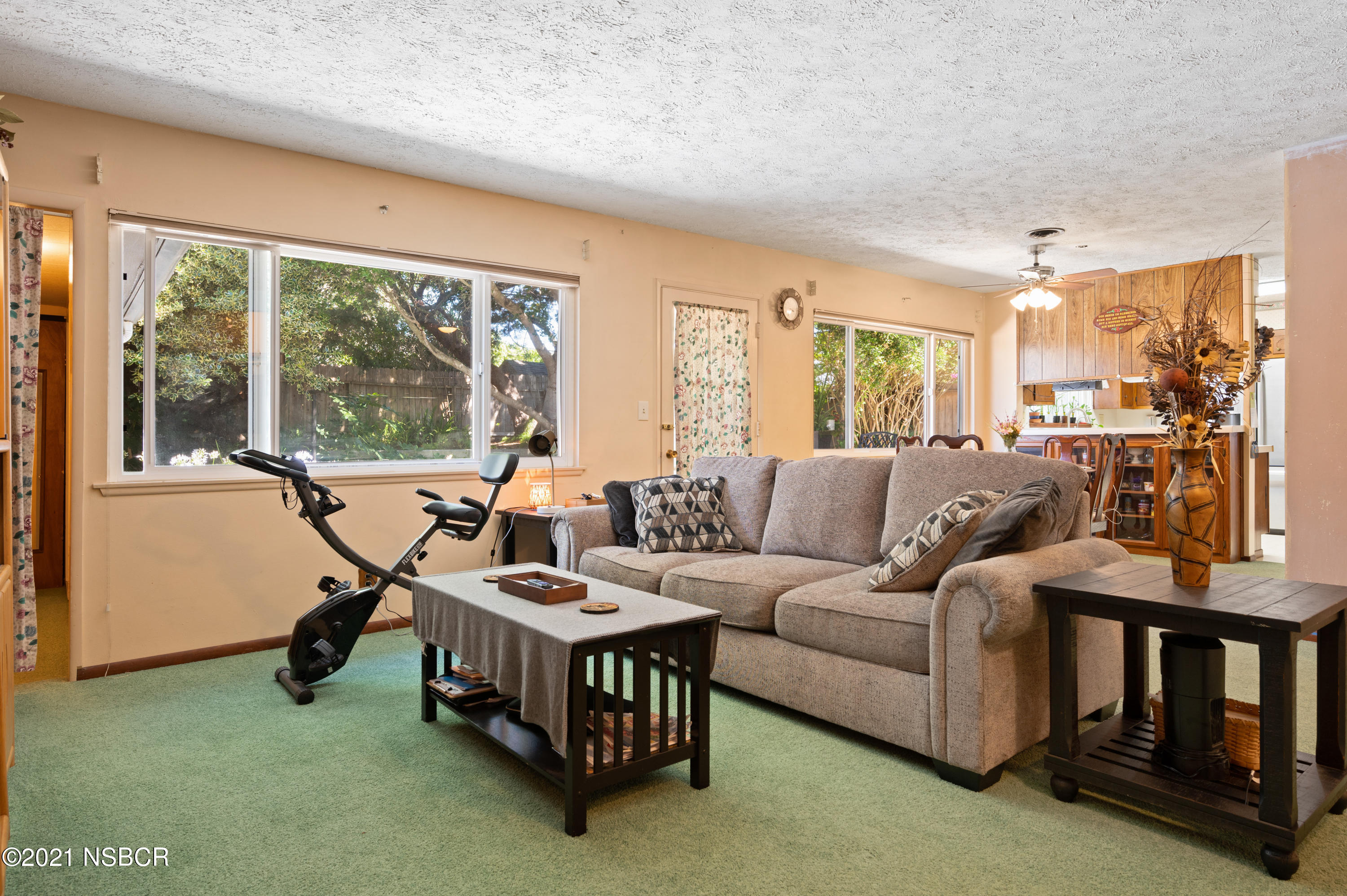 3432 Rucker Road Lompoc, CA 93436 - Photo 7 of 17 a living room with furniture and a floor to ceiling window
