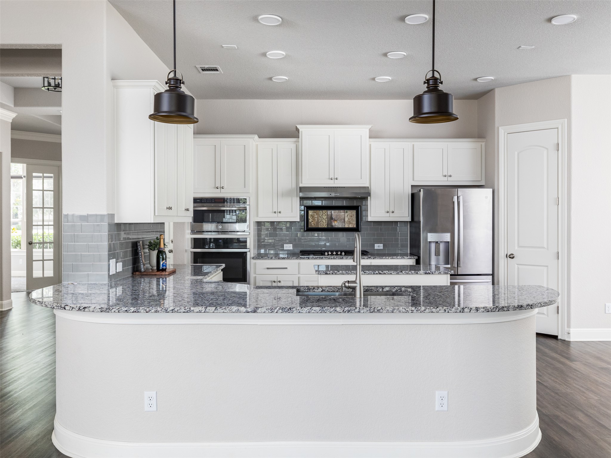 1329 Siena Sunset Road Leander, TX 78641 - Photo 14 of 40 Kitchen with all modern stainless steel appliances