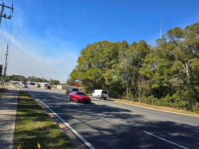 a view of a street with houses