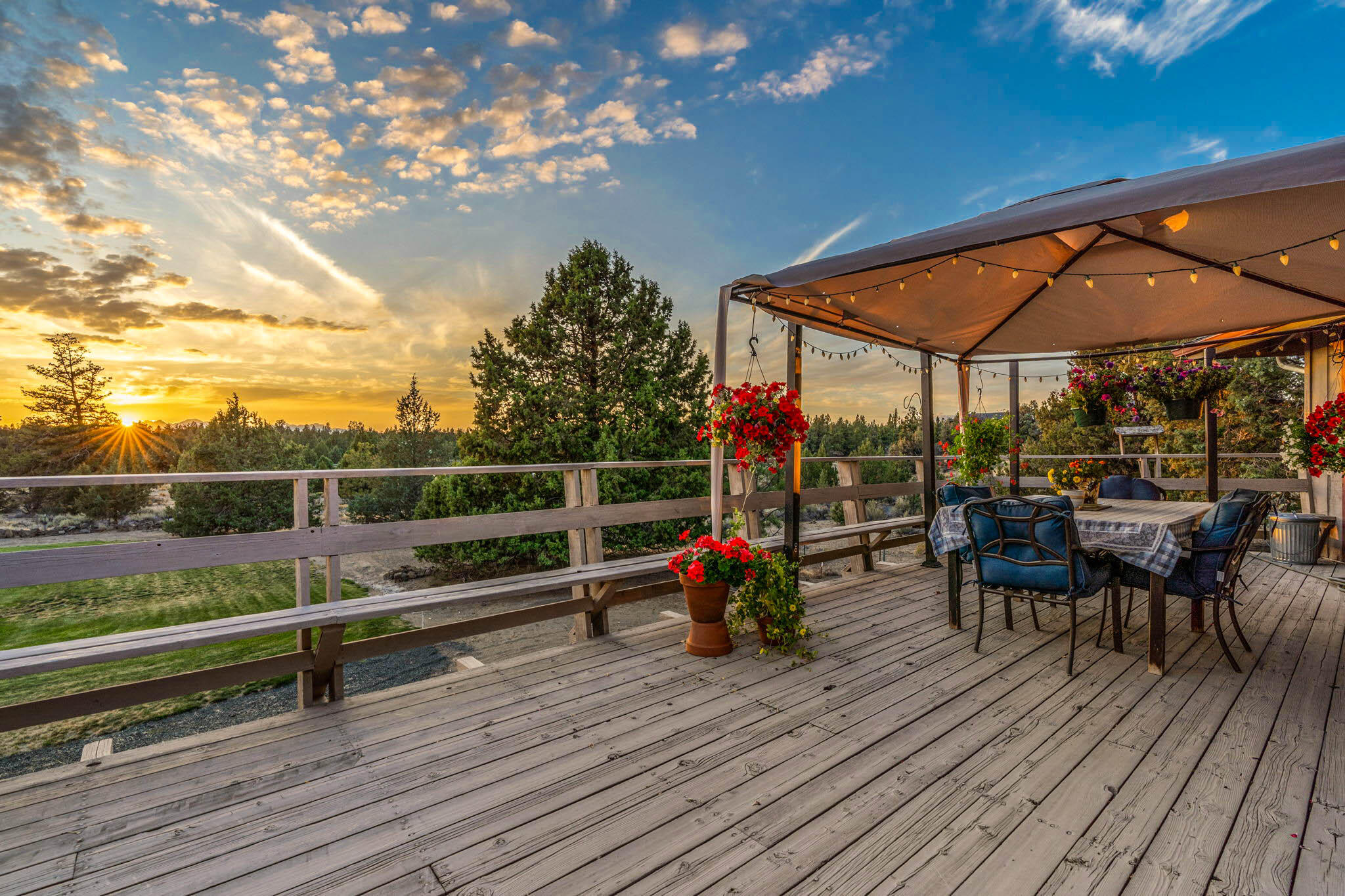 61785 Ten Barr Ranch Road Bend, OR 97701 - Photo 1 of 53 deck at sunset