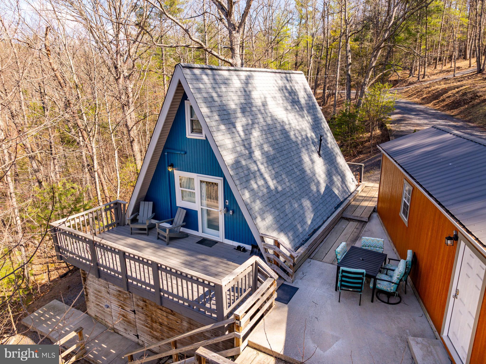 182 Deer Trail Mount Jackson, VA 22842 - Photo 23 of 35 a view of house with outdoor seating