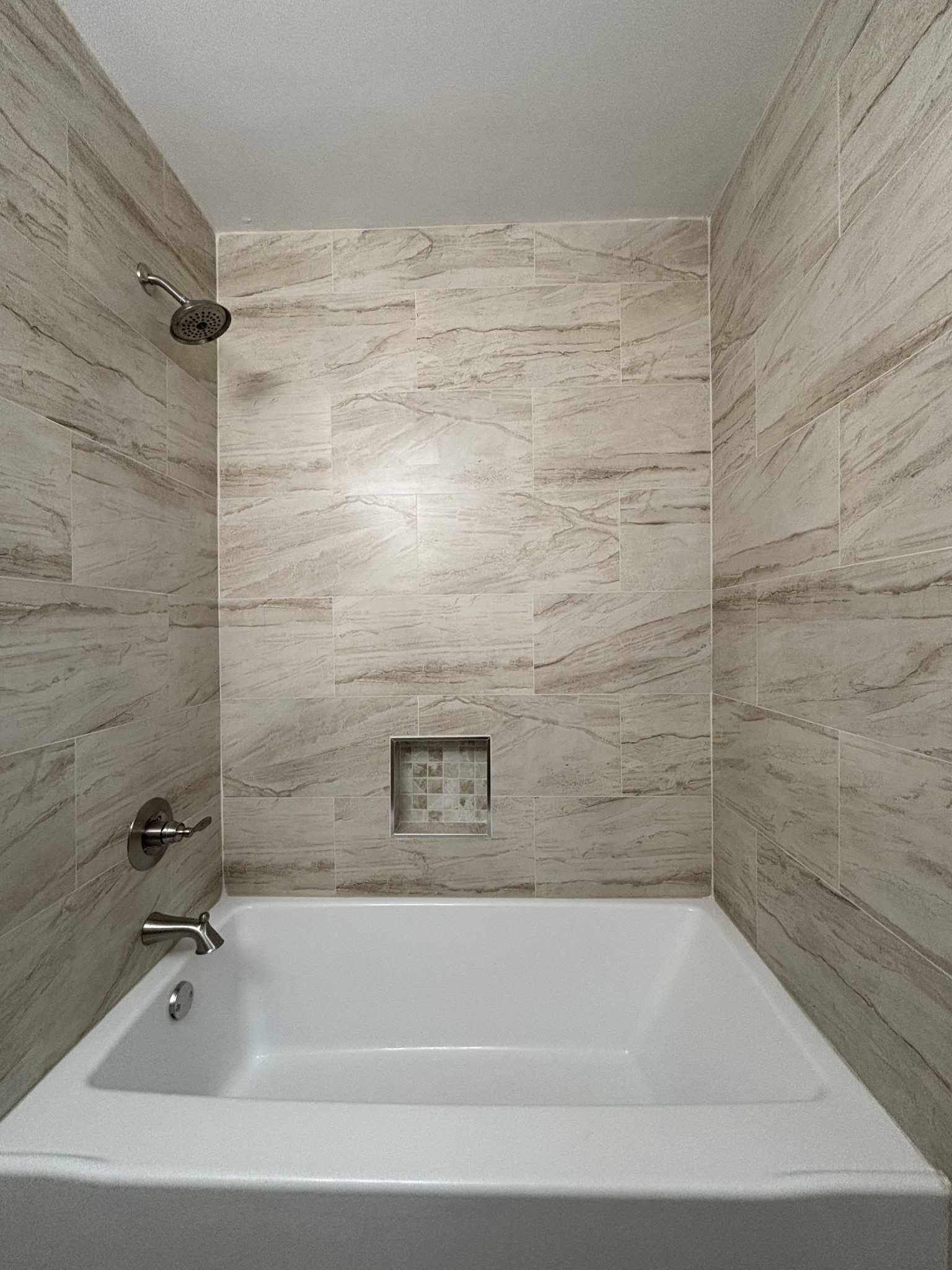 1830 Lowe Street Lewisburg, TN 37091 - Photo 16 of 22 a bathroom with a shower and a bathtub