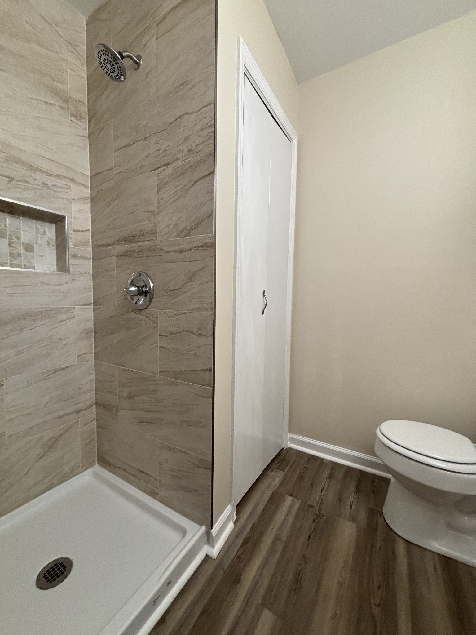 1830 Lowe Street Lewisburg, TN 37091 - Photo 19 of 22 a bathroom with a granite countertop bathtub shower and toilet