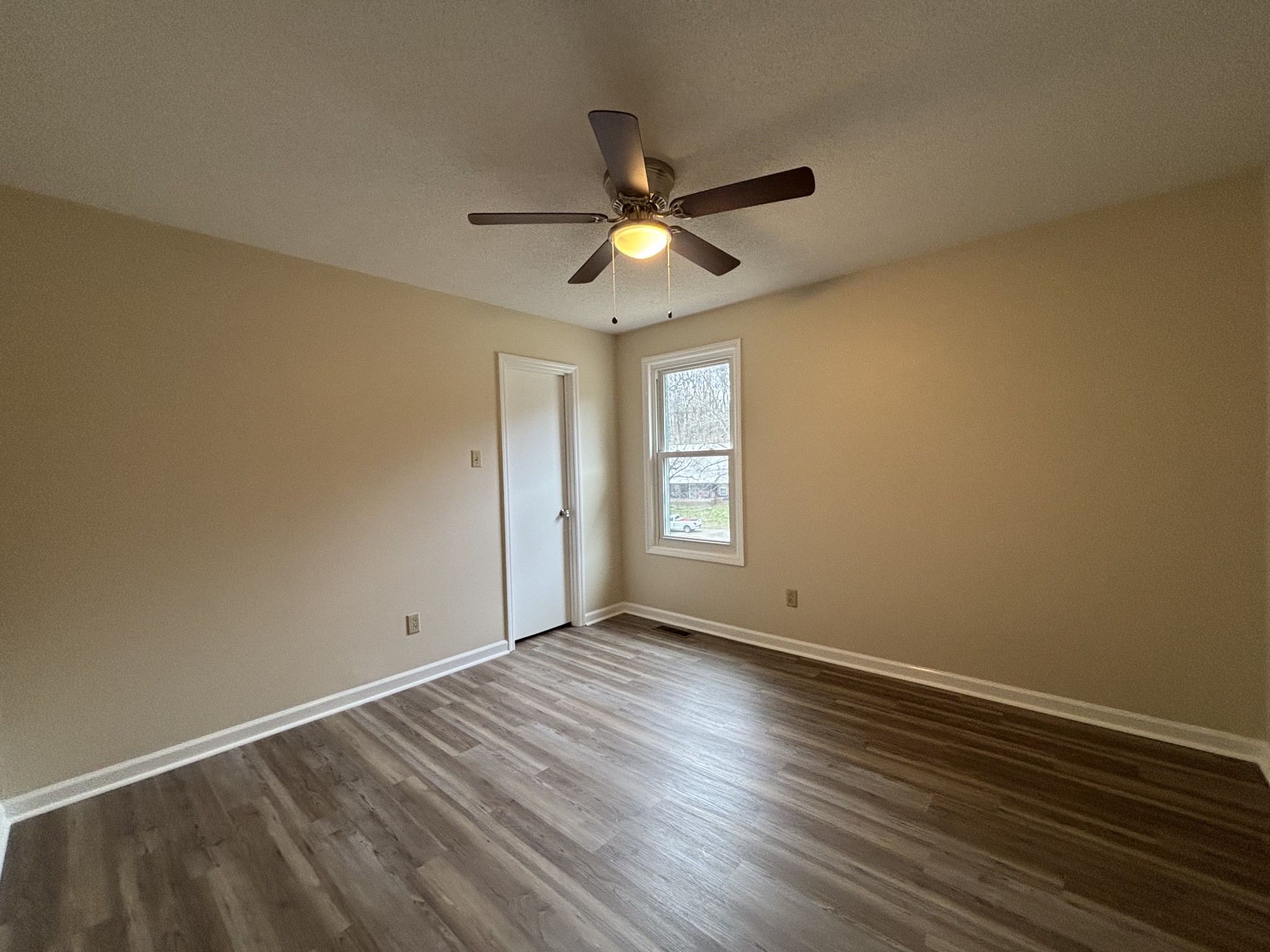 1830 Lowe Street Lewisburg, TN 37091 - Photo 21 of 22 a view of empty room with wooden floor and fan