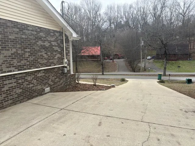 a kitchen with a sink and a refrigerator