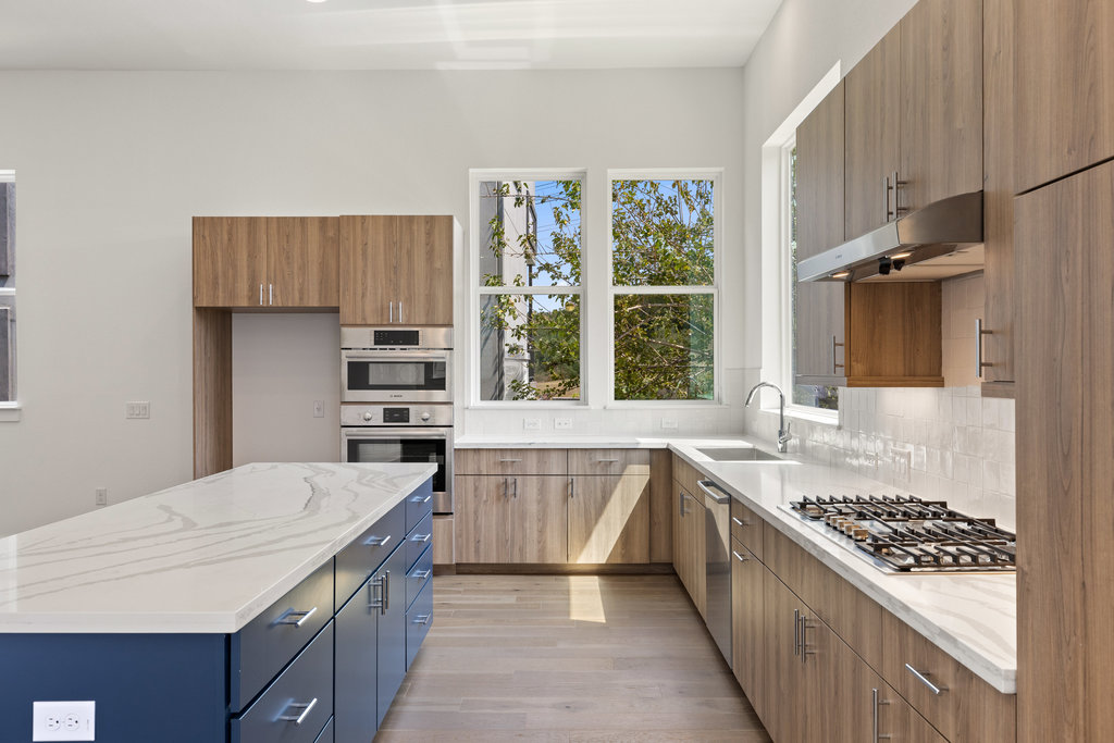 Designer finishes including Bosch appliances and modern cabinetry.