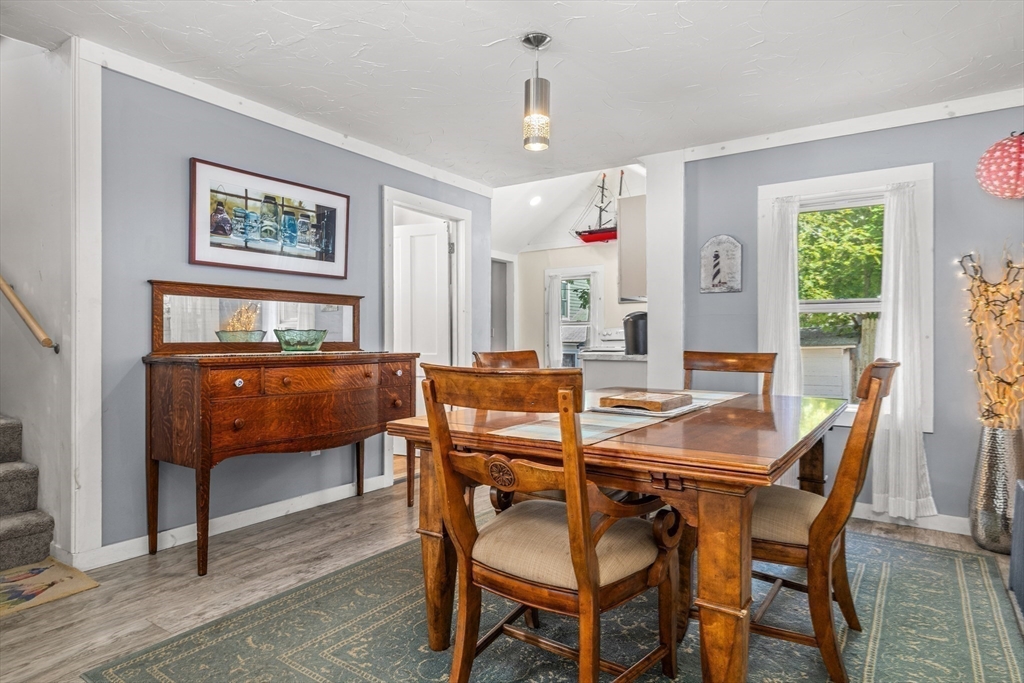 25 Union Avenue Wareham, MA 02558 - Photo 11 of 32 a view of a dining room with furniture window and wooden floor