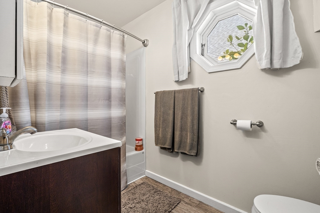 25 Union Avenue Wareham, MA 02558 - Photo 12 of 32 a bathroom with a sink and a mirror