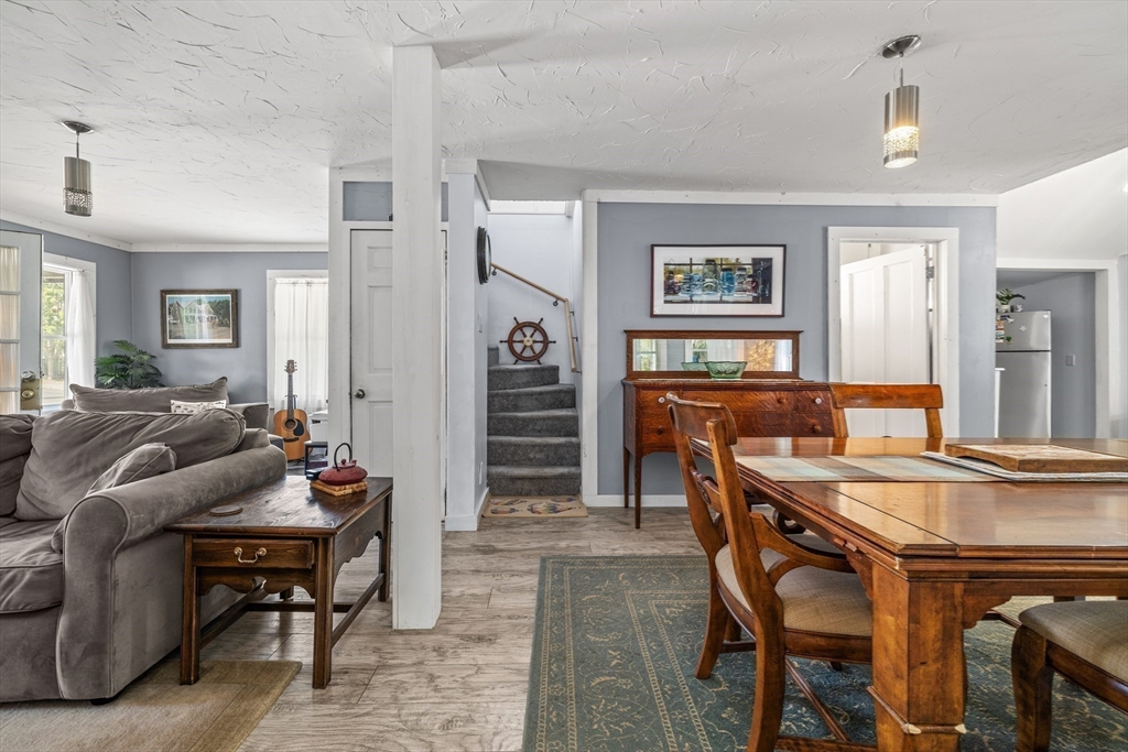 25 Union Avenue Wareham, MA 02558 - Photo 18 of 32 a living room with furniture and a wooden floor