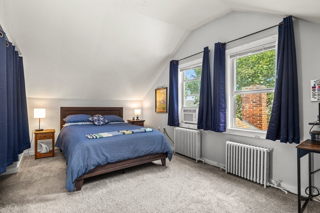 25 Union Avenue Wareham, MA 02558 - Photo 19 of 32 a bedroom with a bed and a window