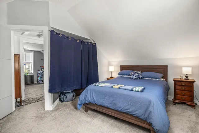 a bed room with a bed and a couch