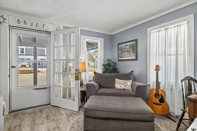 a bedroom with furniture and a window