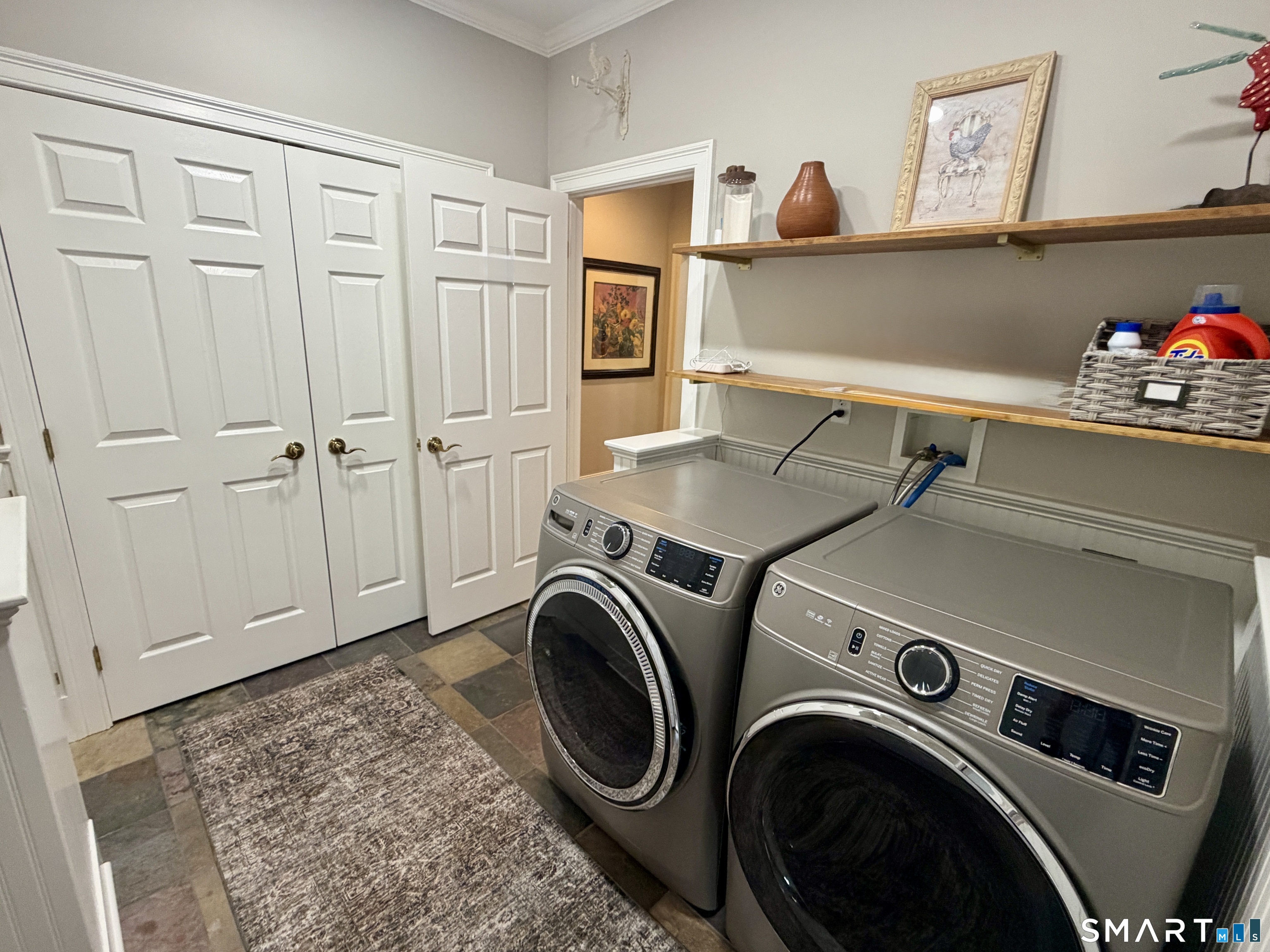 6 Winding Way, Unit 6 Trumbull, CT 06611 - Photo 21 of 37 a utility room with dryer and washer